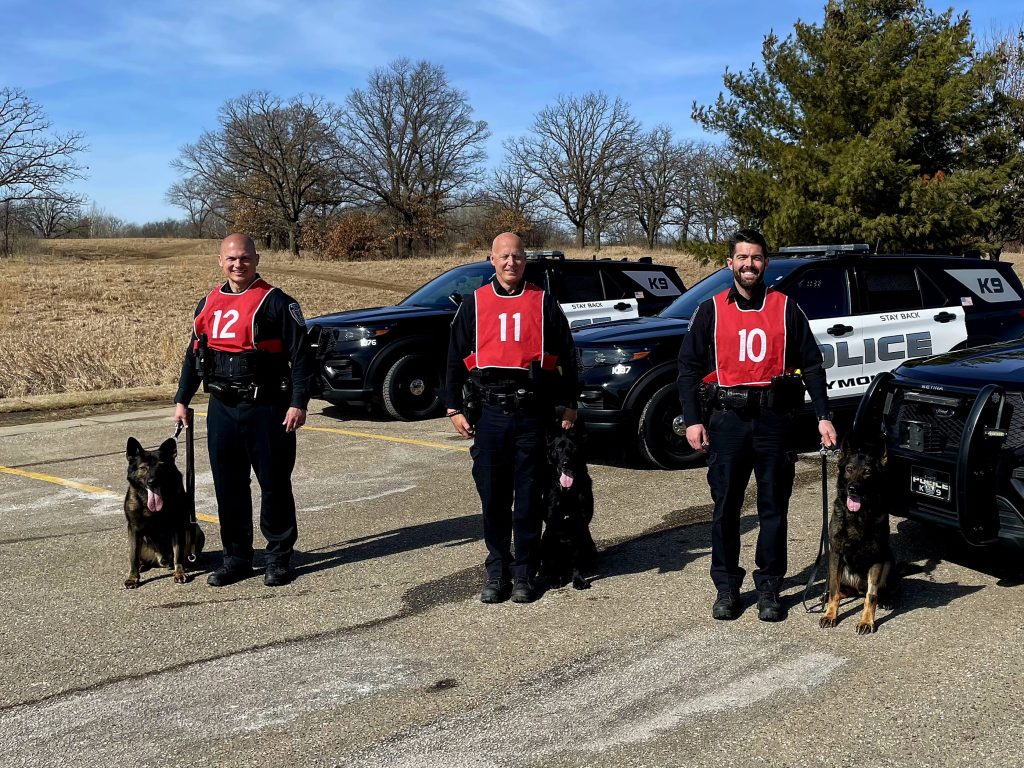 Sergeant Quincy Grabau & K9 Romeo (Retiring End of 2025), Officer Jake Coopet & K9 Reign and Officer Ben Duncan & K9 Rico (left to right)